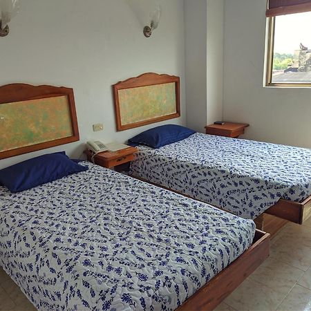 Hotel Armont Calarca Bagian luar foto