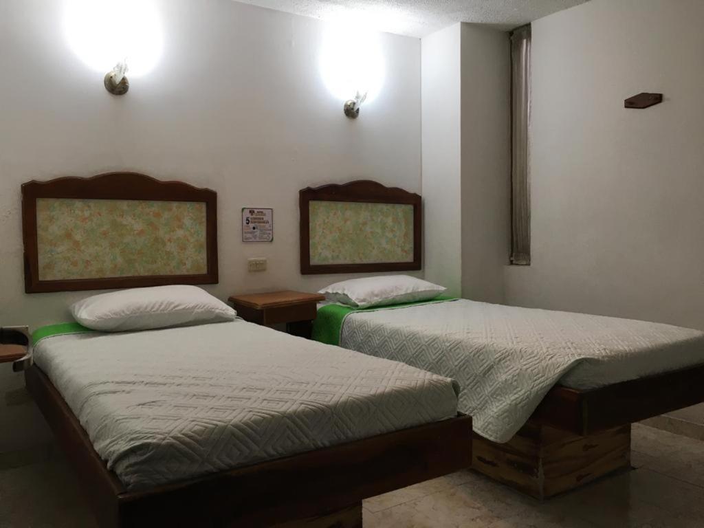 Hotel Armont Calarca Bagian luar foto