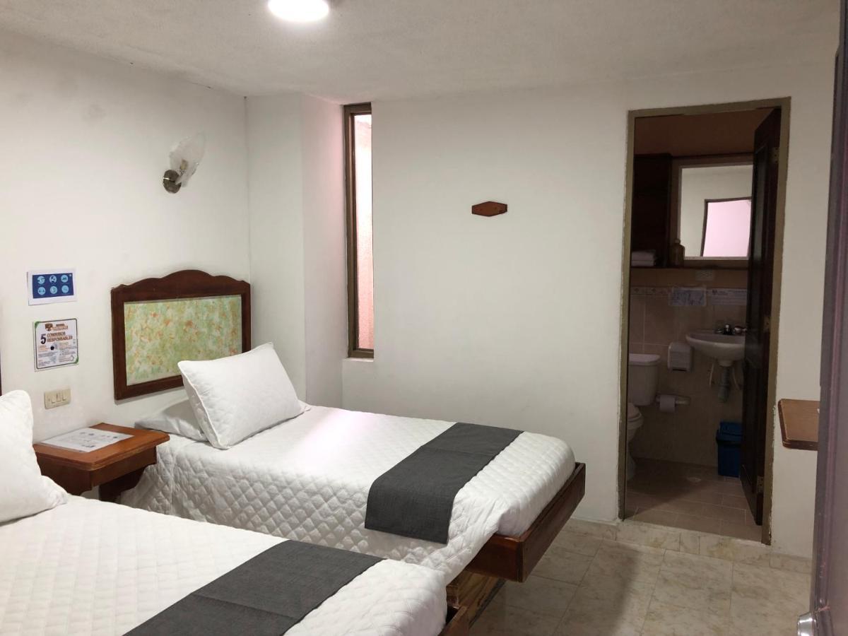 Hotel Armont Calarca Bagian luar foto