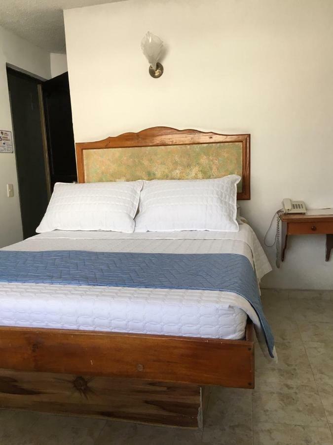 Hotel Armont Calarca Bagian luar foto